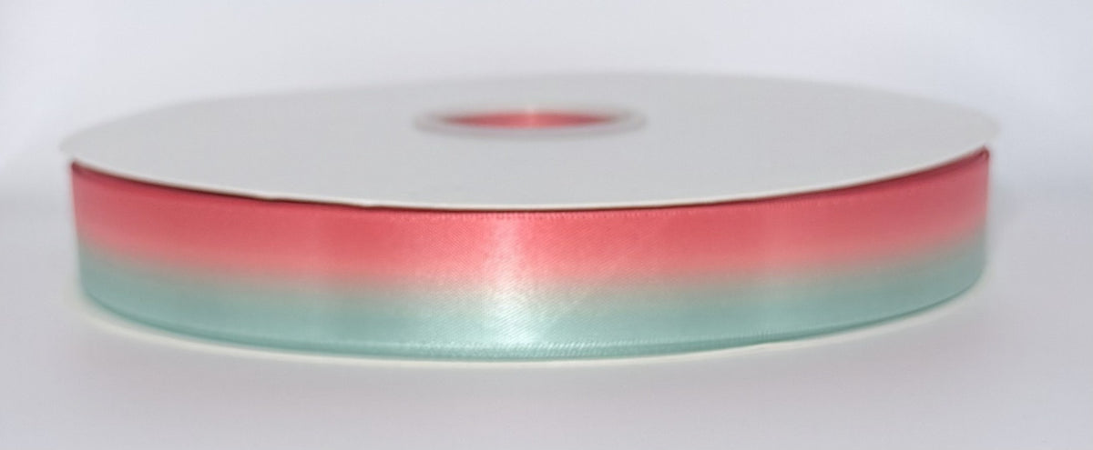 Actual Flamingo Bay ribbon roll showing coral pink and pale aqua