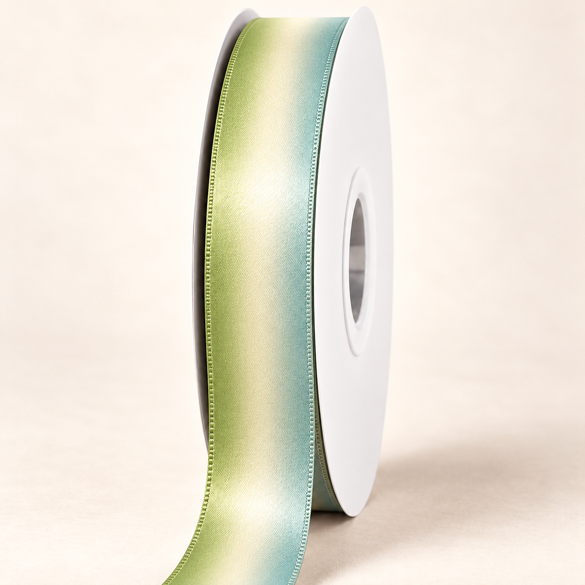 Baby's Breath Satin Ribbon — 22 mm satin ribbon on a white roll against an ivory background