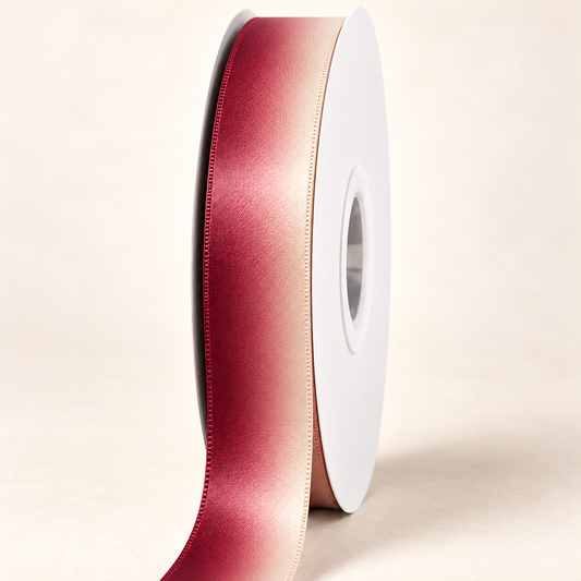 Island Rose Double-faced Satin Ribbon — 22 mm satin ribbon on a white roll against an ivory background