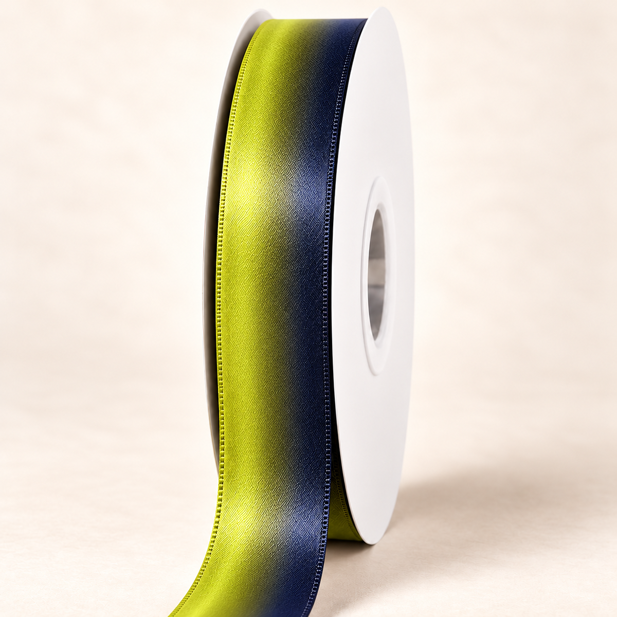 Knight Fall satin ribbon on a white spool with chartreuse yellow-green and midnight blue