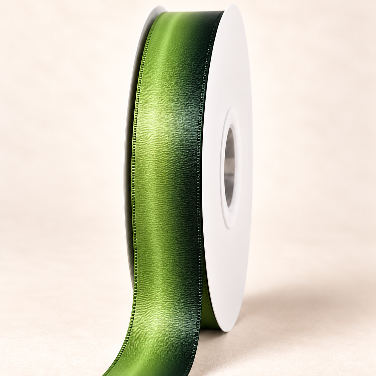 Matcha satin ribbon on a white spool with fresh matcha green and deep forest green