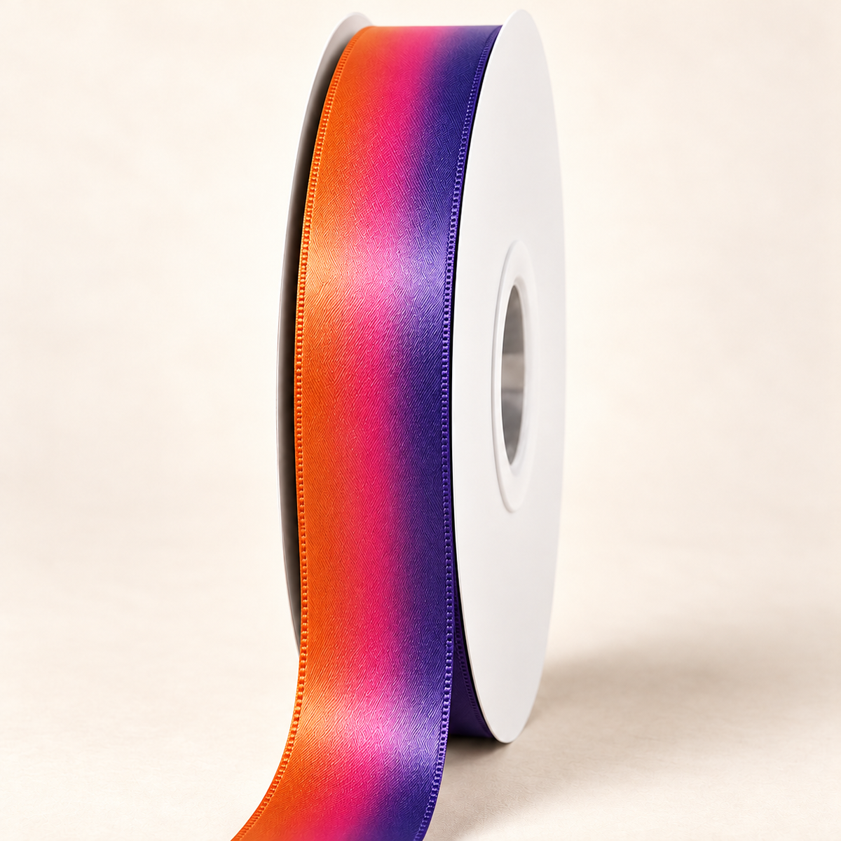 Pineapple Butterfly - Double-faced Satin Ribbon — 22 mm satin ribbon on a white roll against an ivory background