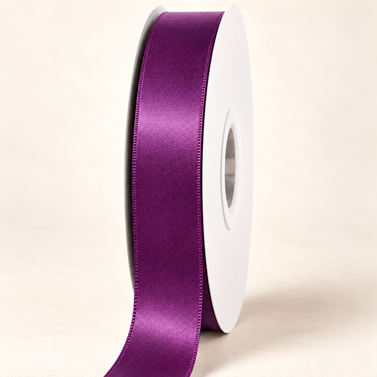 Amethyst — 22 mm satin ribbon on a white roll against an ivory background