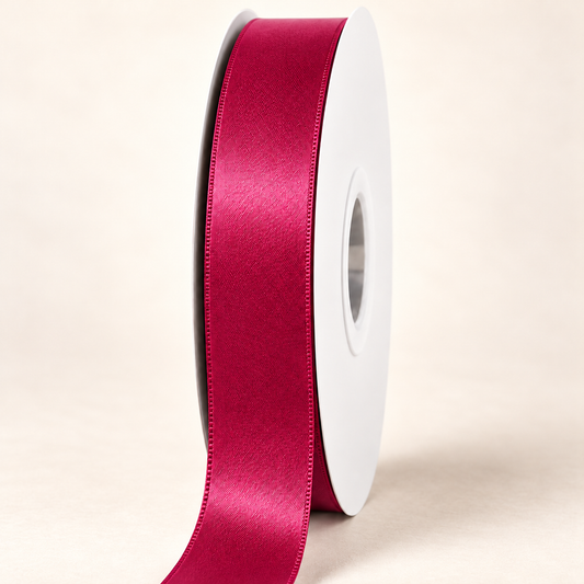 Beauty — 22 mm satin ribbon on a white roll against an ivory background