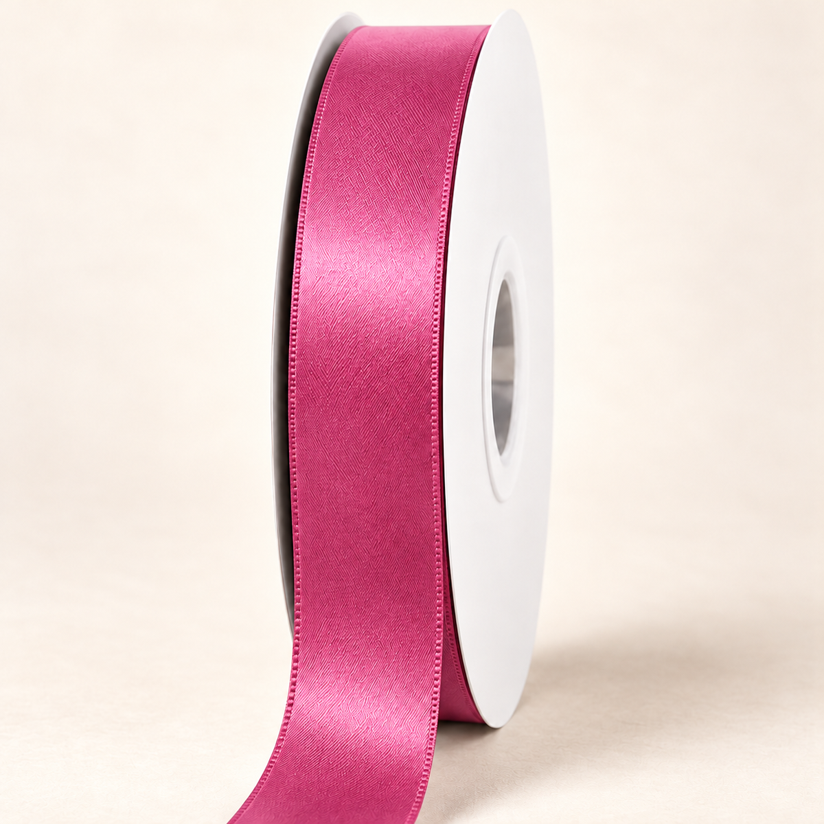 Garden Rose — 22 mm satin ribbon on a white roll against an ivory background