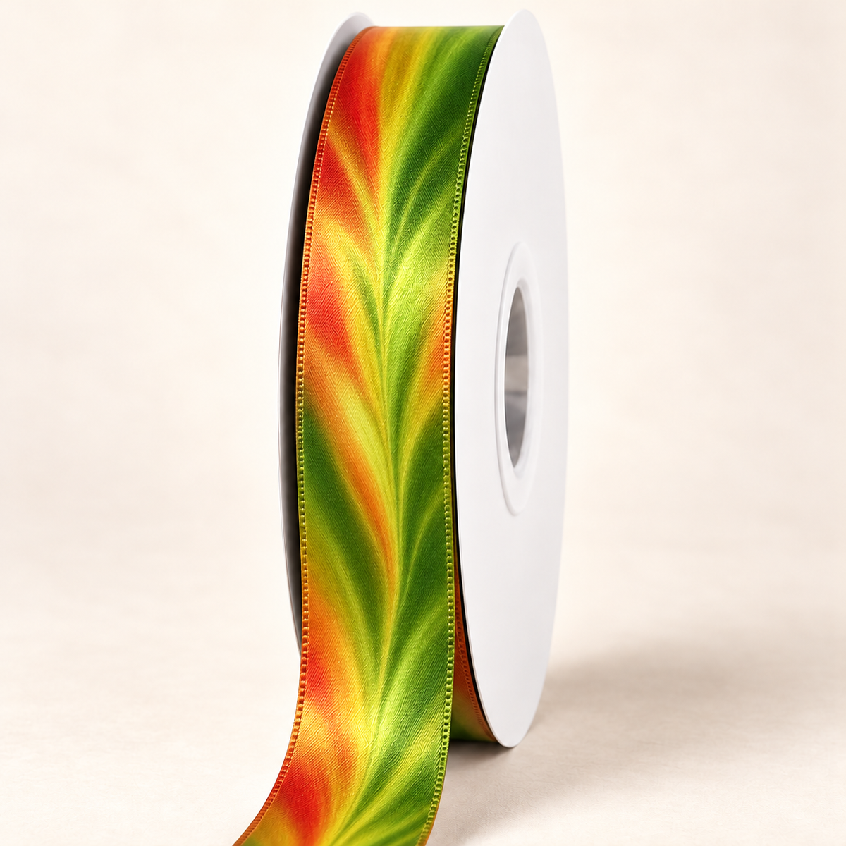 Sunrise Ti — 22 mm satin ribbon on a white roll against an ivory background