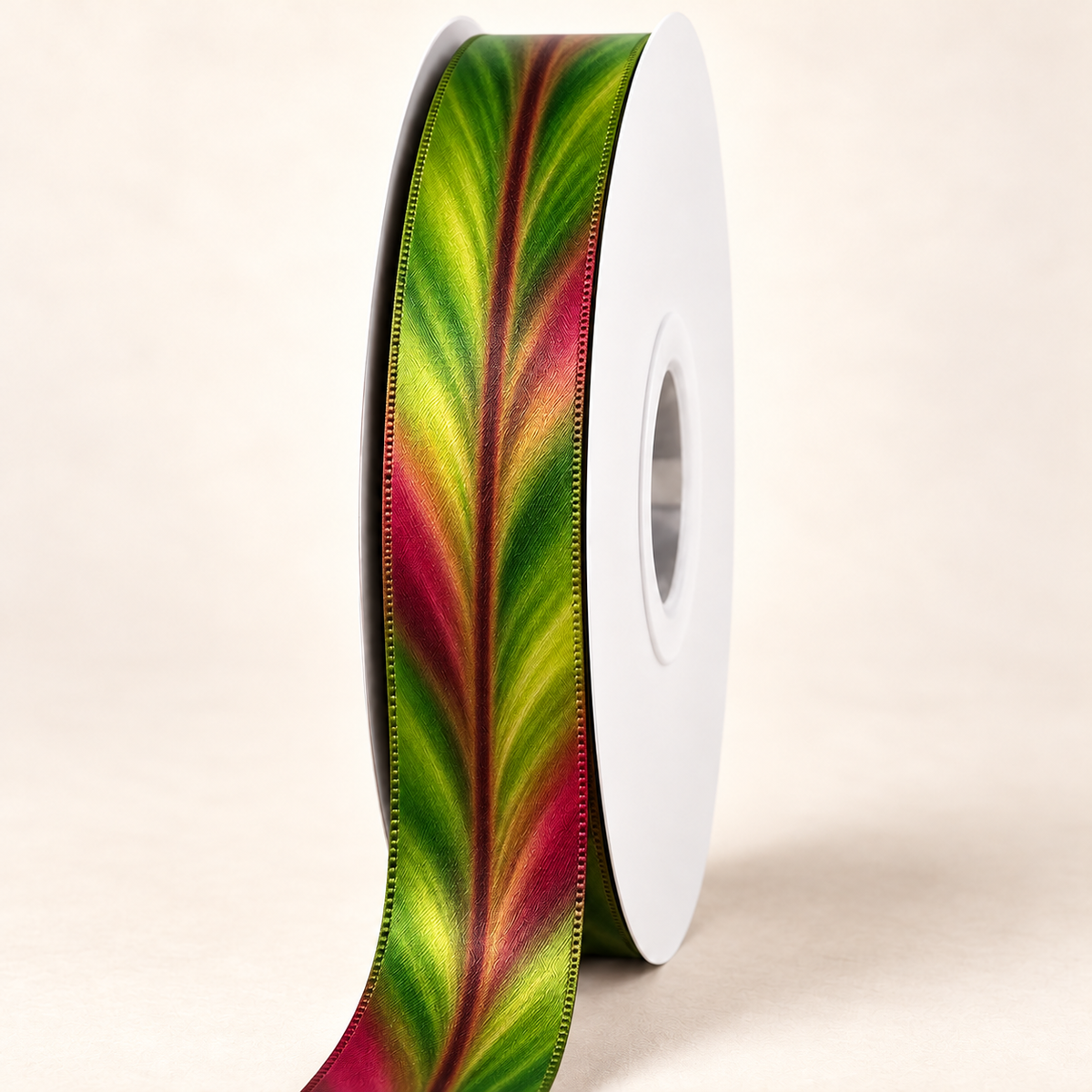 Volcanic Ti Double-faced Satin Ribbon — 22 mm satin ribbon on a white roll against an ivory background