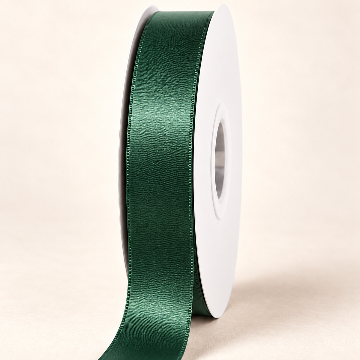 Warrior - Solid Color Double-Sided Satin Ribbon — 22 mm satin ribbon on a white roll against an ivory background